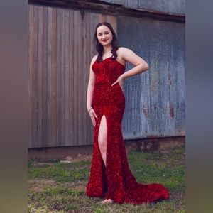 Selling this beautiful Red prom / formal dress !! Has been worn one time.